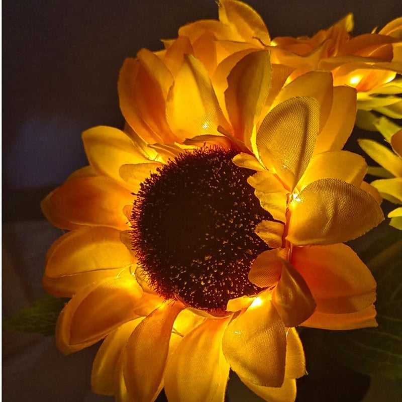 Vaso di girasoli luminosi