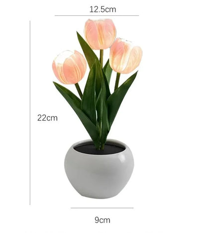 Vaso di tulipani luminosi